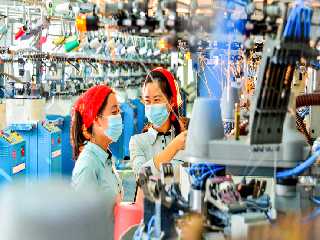 Dans l’usine des chaussettes de Pyongyang